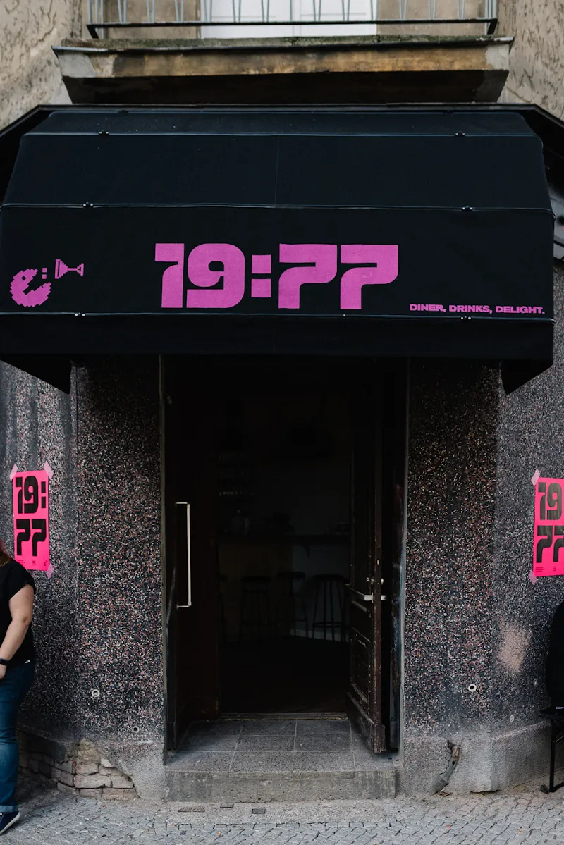 19:77
